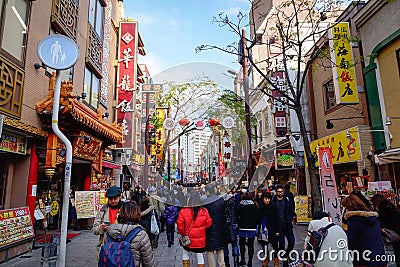 People walking on street at Chinatown district in Yokohama, Japan Editorial Stock Photo