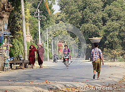 People walking on street at Mingun village in Mandalay, Myanmar Editorial Stock Photo