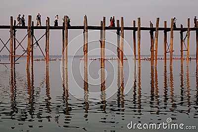 People walking on the Ubein bridge in Mandalay, Myanmar Editorial Stock Photo