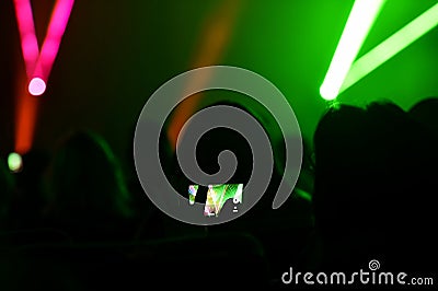 People watching laser show Stock Photo