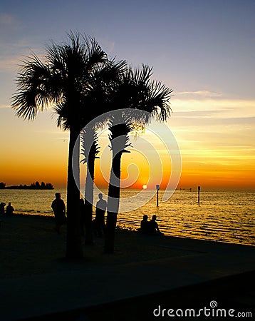 People watching the sunset at Hudson Beach Florida Stock Photo