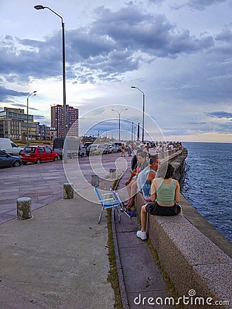 People at waterfront boardwalk, montevideo, uruguay Editorial Stock Photo