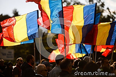 People wave the Romanian flag during a rally Editorial Stock Photo