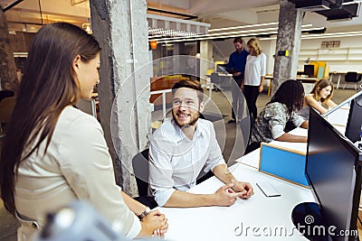 People working at busy modern office Stock Photo