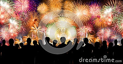 Peoples in silhouette enjoy watching amazing firework Stock Photo