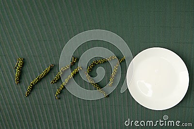 pepper With corrugated green paper Stock Photo