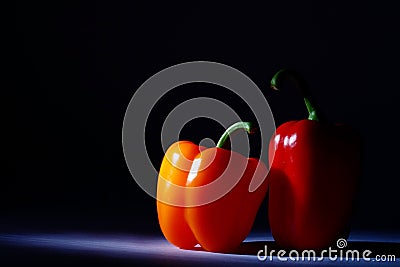 Pepper pair on a drak background Stock Photo
