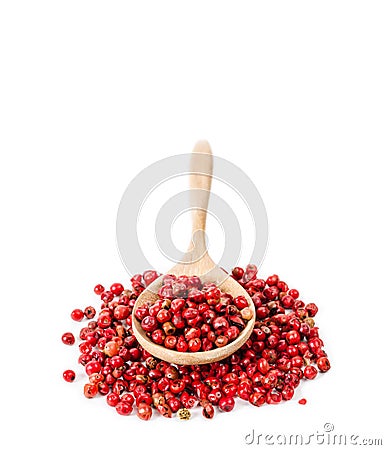 Pepper red peppercorns in wooden spoon. Stock Photo