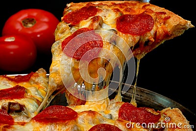Pepperoni Pizza Slice Stock Photo