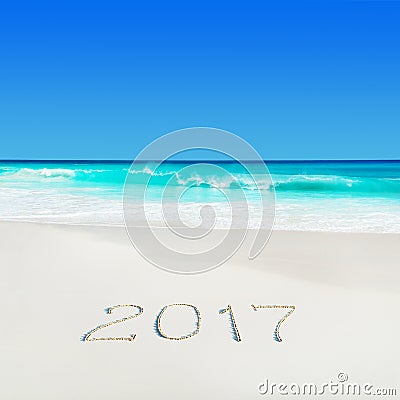 Perect white sand ocean beach and year 2017 season caption Stock Photo