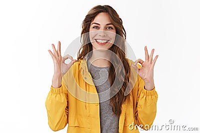 Perfect app recommend. Satisfied beautiful caucasian girl 25s show okay ok excellent gesture smiling broadly optimistic Stock Photo