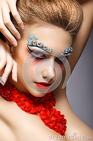 Perfect Fashion Woman Face with Strass - Bright Eye Makeup. Theater Stock Photo