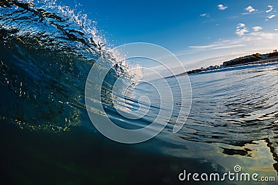 Perfect glassy wave in sea. Crashing surfing wave and sky Stock Photo