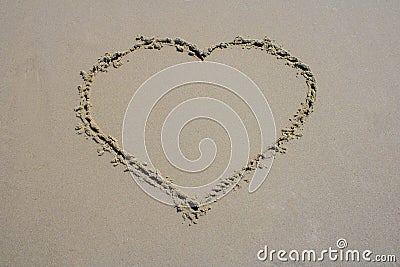Perfect heart in the sand Stock Photo