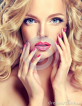 Perfect make-up and pink manicure. Stock Photo