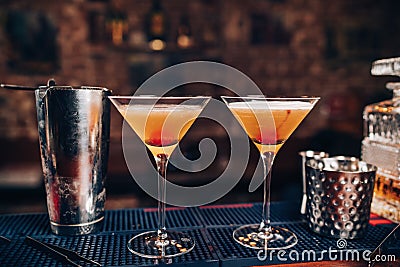 Perfect manhattan cocktails, alcoholic drinks. Fresh alcoholic beverages on bar counter Stock Photo