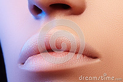 Perfect Natural Lip Makeup. Close Up Macro Photo with Perfect Clean Skin, Light Fresh Lip Make-up. Beautiful Spa Lips Stock Photo
