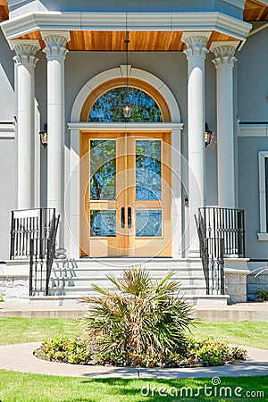 Entrance of luxury family residential house with doorsteps in front Stock Photo