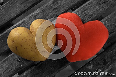 Perfect potato heart with a red heart Stock Photo