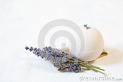 Perfect for relaxation. Cosmetic jars and bottles with salt, lavender flowers, bath bomb Stock Photo