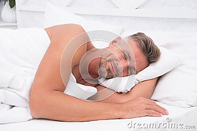 Perfect rest. Sleeping beauty. Man handsome guy lay in bed. Get enough amount of sleep every night. Tips sleeping better Stock Photo