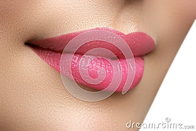 Perfect smile. Beautiful full pink lips. Pink lipstick. Gloss li Stock Photo