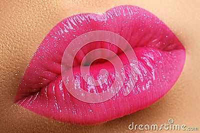 Perfect smile. Beautiful full pink lips. Pink lipstick. Gloss li Stock Photo