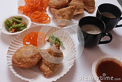 Perfect Start Of The Day With Fresh Indian Kachori Samosa and Jalebi. Indian food. Snacks. Stock Photo