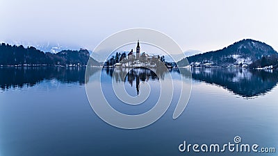 Perfect symetry of a lake and church on small island Stock Photo