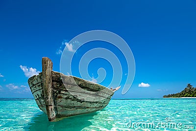 Perfect tropical island paradise beach and old boat Stock Photo