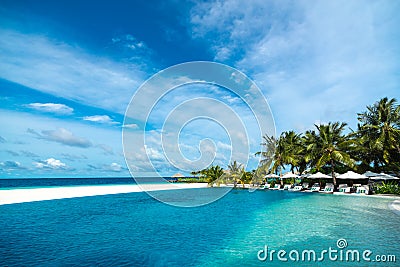 Perfect tropical island paradise beach and pool Stock Photo