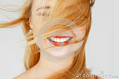 Perfect white smile of red-haired girl, close-up Stock Photo