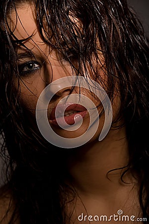 Perfect young model portrait in darkness Stock Photo