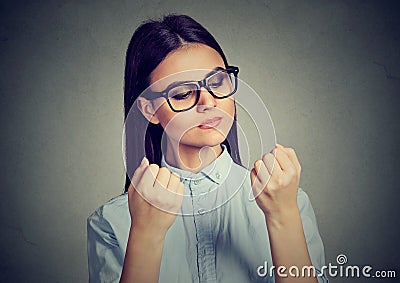 Perfectionist woman looking at nails obsessing about cleanliness Stock Photo