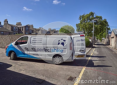 Perfectshine, a small Window Cleaning Company in Aberdeen with one of its Vans parked in Albert Lane, while its Operator does work Editorial Stock Photo