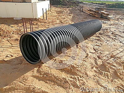 Black corrugated pipe for water canalization Stock Photo