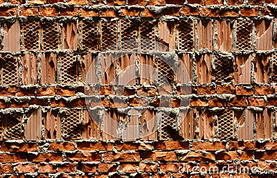 Perforated cavity brick wall textured background Stock Photo