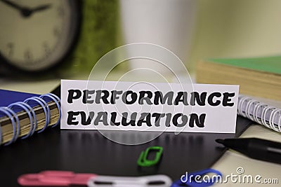 Performance Evaluation on the paper isolated on it desk. Business and inspiration concept Stock Photo