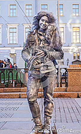 Performance in the open air in St. Petersburg. Pantomime. In the summer of 2016. Street performances the enjoyment of life. Editorial Stock Photo