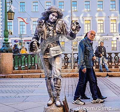 Performance in the open air in St. Petersburg. Pantomime. In the summer of 2016. Street performances the enjoyment of life. Editorial Stock Photo