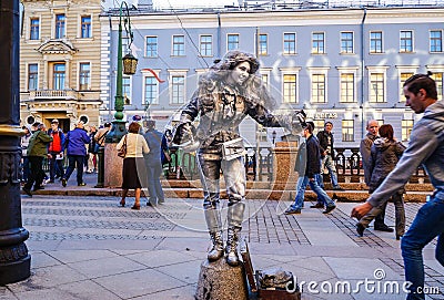 Performance in the open air in St. Petersburg. Pantomime. In the summer of 2016. Street performances the enjoyment of life. Editorial Stock Photo