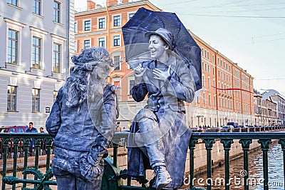 Performance in the open air in St. Petersburg. Pantomime. In the summer of 2016. Street performances the enjoyment of life. Editorial Stock Photo