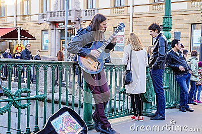 Performance in the open air in St. Petersburg. In the summer of 2016. Street guitar performances. Editorial Stock Photo