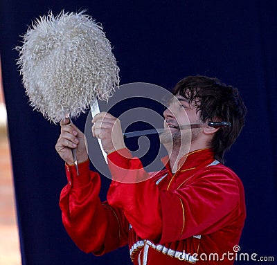 The performance of soloists-dancers of the ensemble imamat ( solar dagestan ) with traditional dances of the north caucasus. Editorial Stock Photo