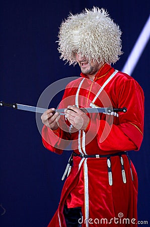 The performance of soloists-dancers of the ensemble imamat ( solar dagestan ) with traditional dances of the north caucasus. Editorial Stock Photo