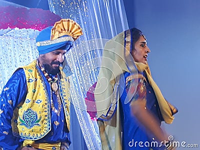 Bhangra Dancers performing on stage Editorial Stock Photo