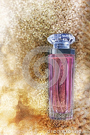 perfume or au de parfume on golden luxury bokeh Stock Photo