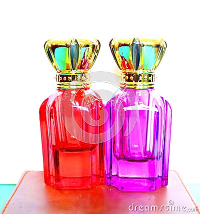 Perfume bottle full of perfume - romantic perfume - pink perfume Stock Photo