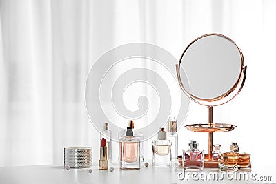 Perfume bottles on table Stock Photo