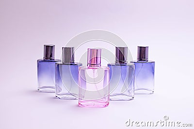 Perfume bottles mockup on white background, with empty labels to place your design. Space text. npink bottle. Stock Photo